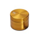 Grinder, zylindrisch, aus goldfarbenem Metall mit...