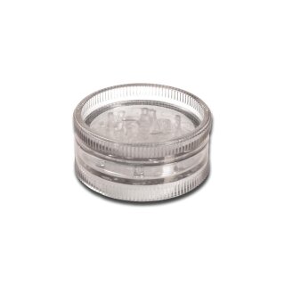 Acrylgrinder 2-tlg in transparenter Optik. Runde Form mit geriffeltem Rand, klare Kunststoffmaterialien, zweiteiliges Design. Obere und untere Kammer mit Zahnung sichtbar.